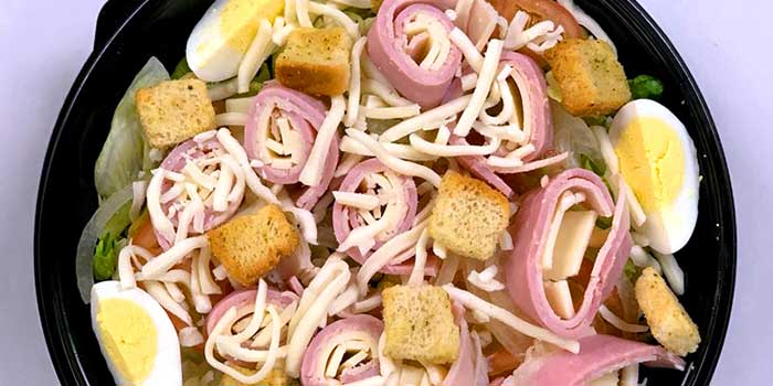 Refreshing salads with croutons meat, boiled egg and veggies served by Bob's Sub in Pennsylvania.